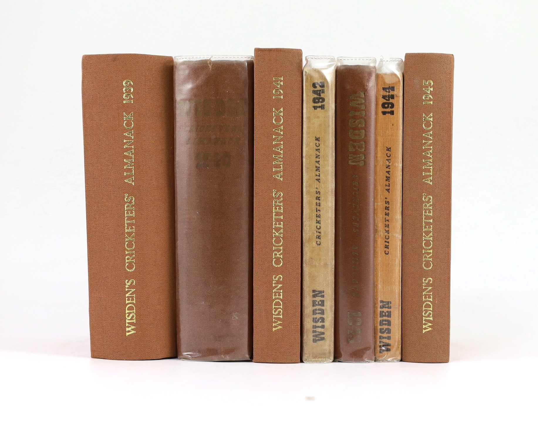 Wisden, John - Cricketers Almanack for the Second World War Years - 1939 (76th edition) - 1945 (82nd edition), rebound issues for 1939, 1941 and 1945, all retaining original paper wrappers, original hardbacks for 1940 an
